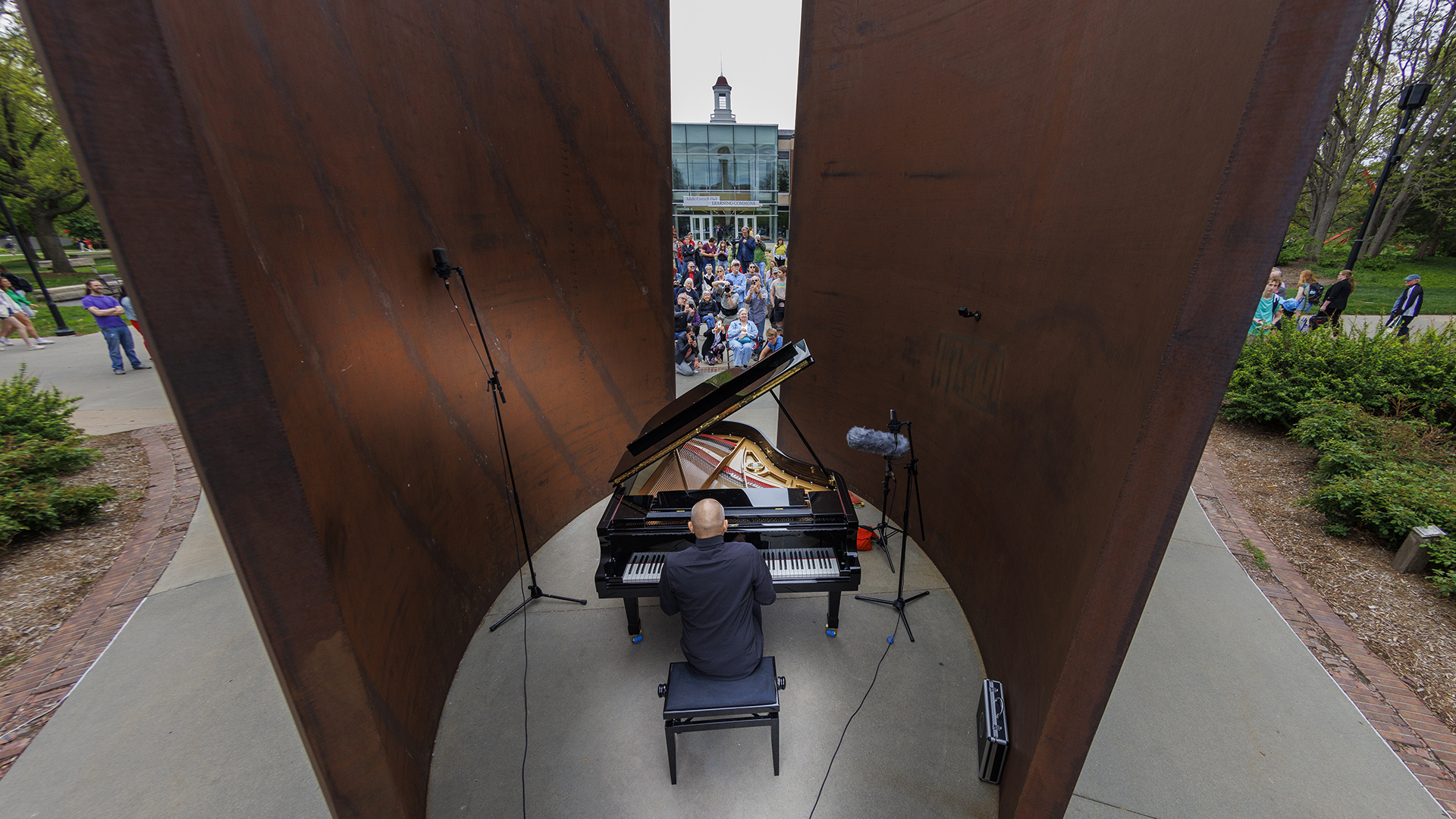 Pianist Paul Barnes performs Philip Glass inside Richard Serra Sculpture